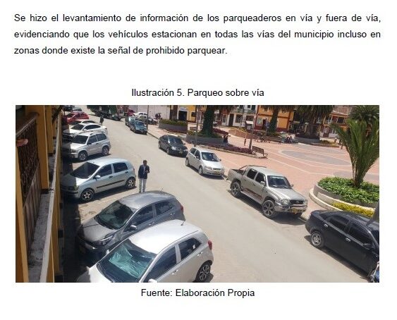 Vehículos estacionados sobre la vía en el municipio de Ventaquemada, incluyendo zonas con restricción de parqueo.